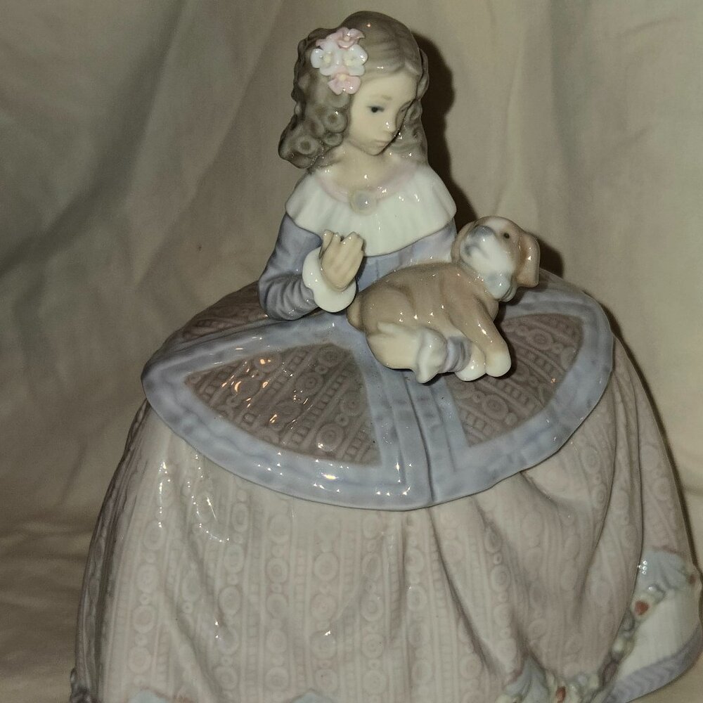 Retired Lladro Pilar Girl with Pup, possibly missing a petal from bouquet